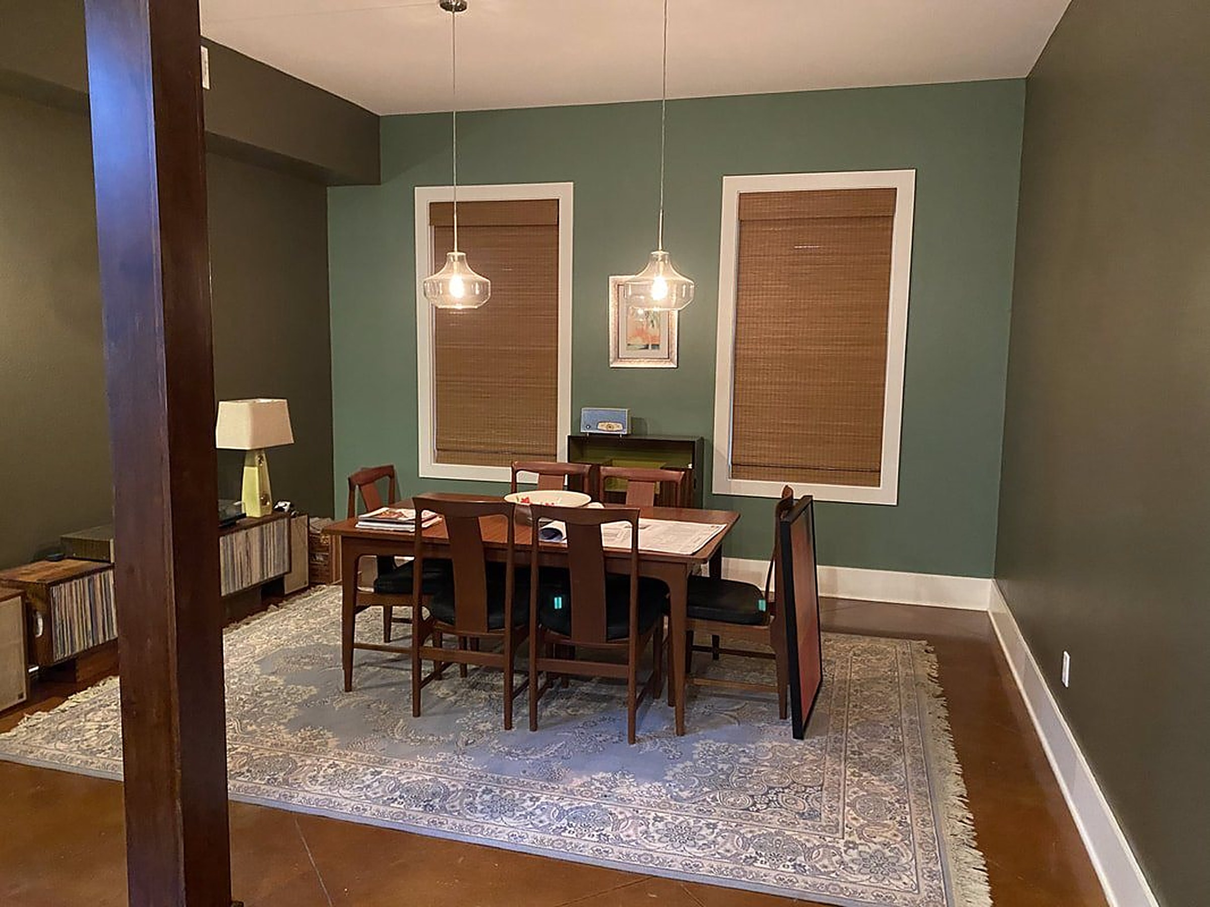 Pair of windows fitted with light-filtering manual shades